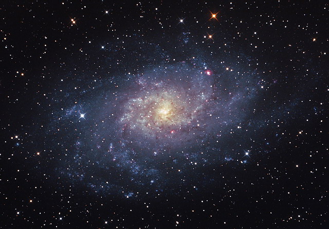 М33 спиральная галактика в созвездии треугольника